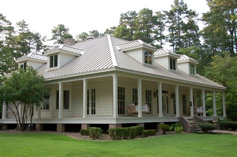 beige house with gray metal roofing|beige metal roof exterior ideas.